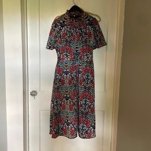 SOLD Gorgeous floral dress with butterfly sleeves, hidden back zipper, size 6